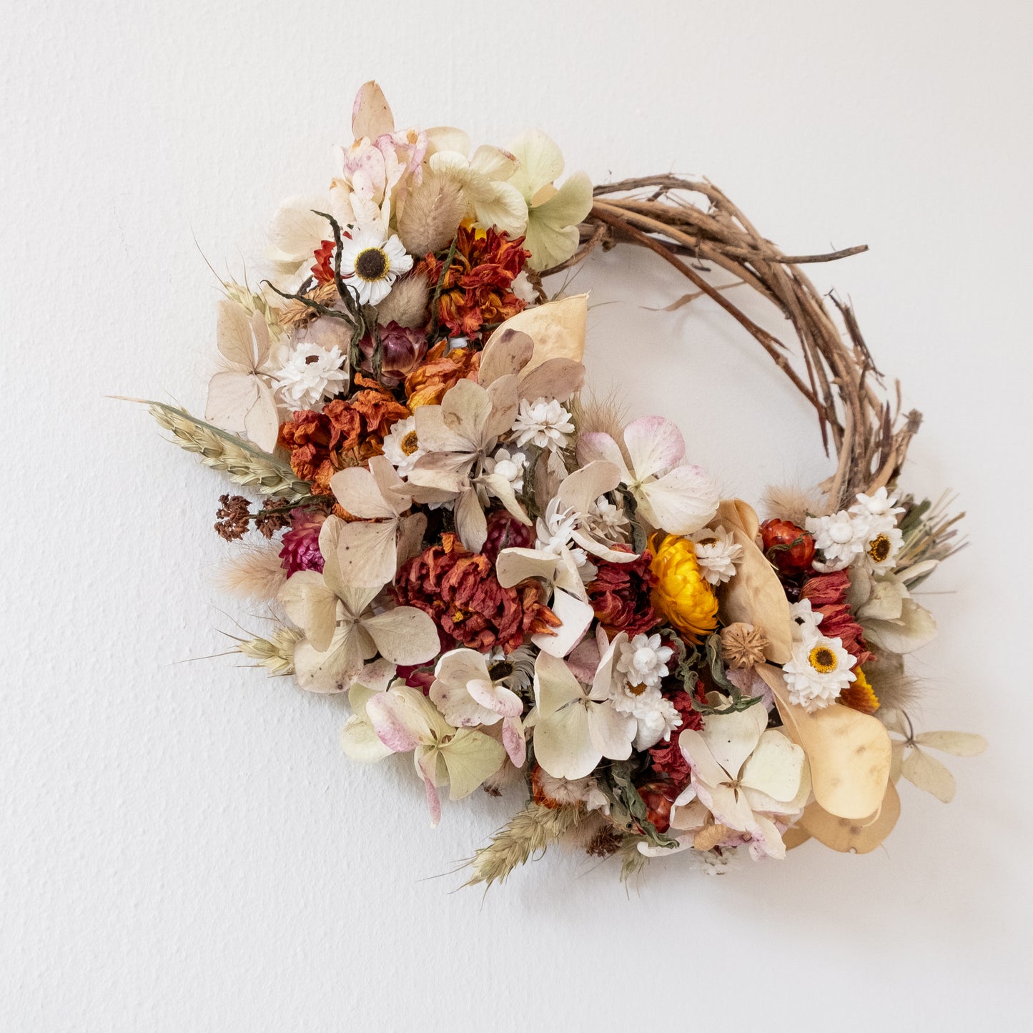 Rustic orange dried flower wreath