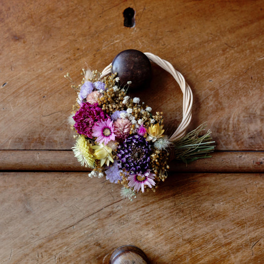colourful mini dried flower wicker wreath, pink, yellow and lilac, purple